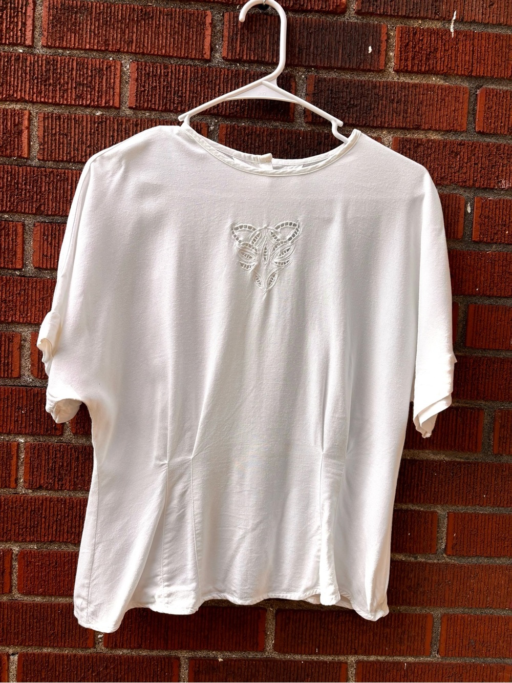 White Women's Short-Sleeve Top with Embroidered Detail button down back